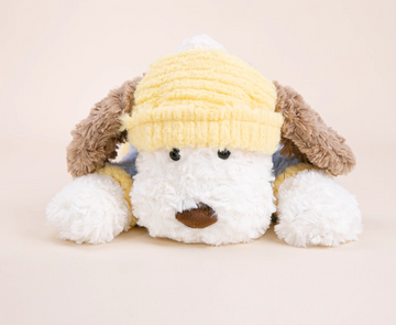 Cute stuffed animal with a lying dog